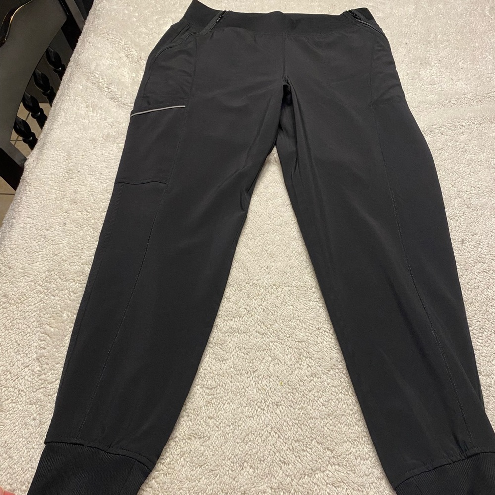 Cherokee Infiniti joggers. Color is black. Size is medium. Flattering side zips